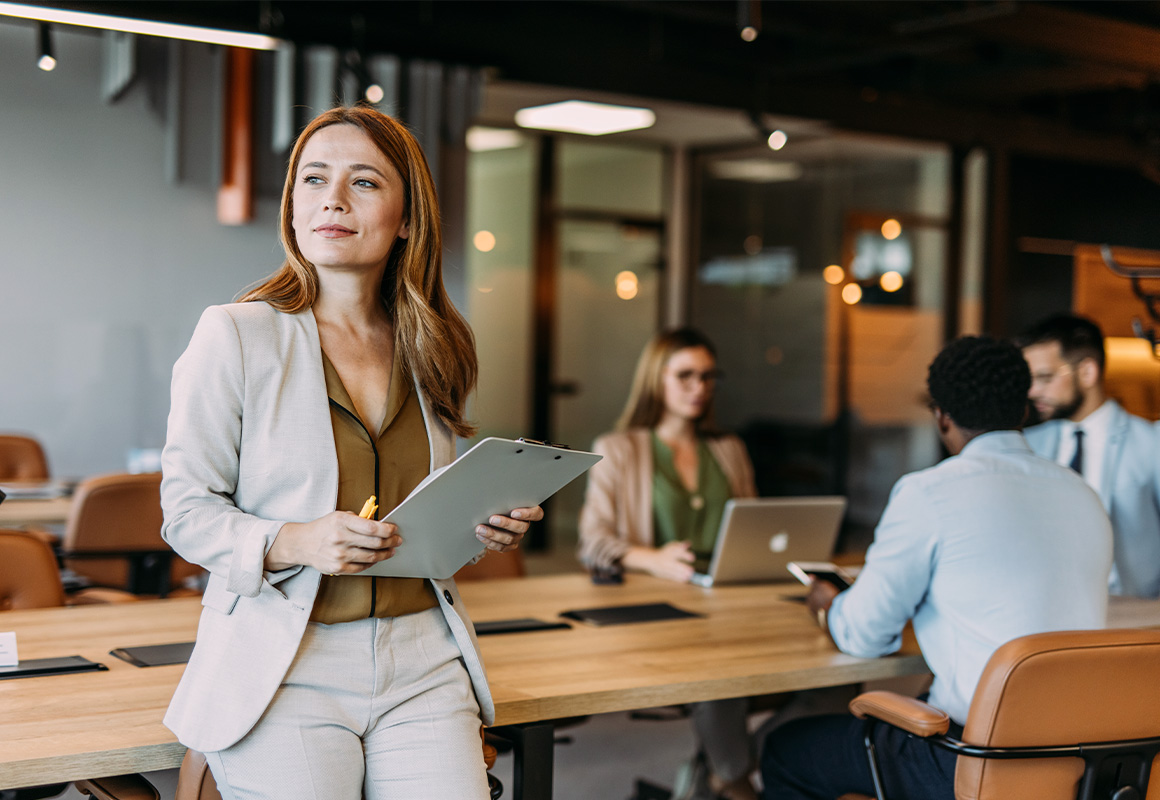 woman with clipboard in office