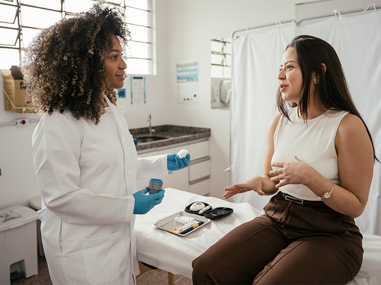 doctor speaking with patient