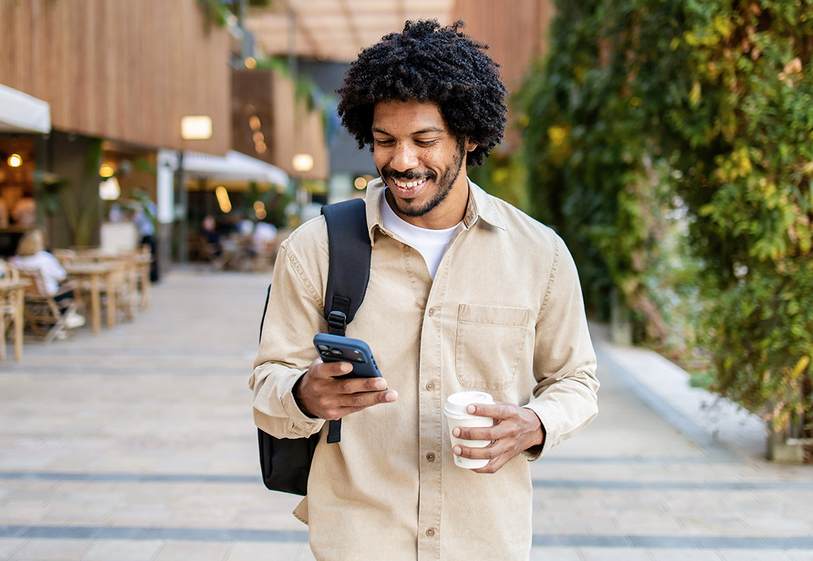 man walking with phone