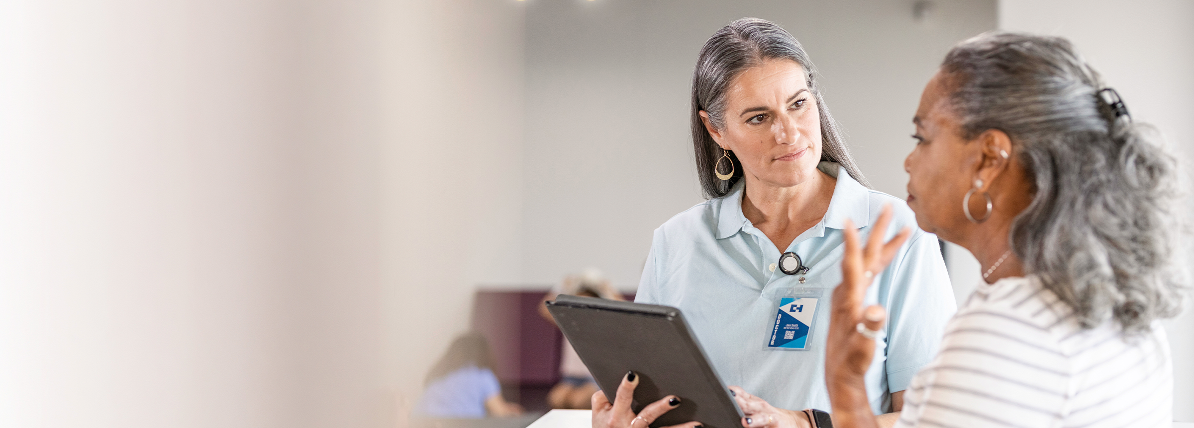 Elderly patient at specialty appointment