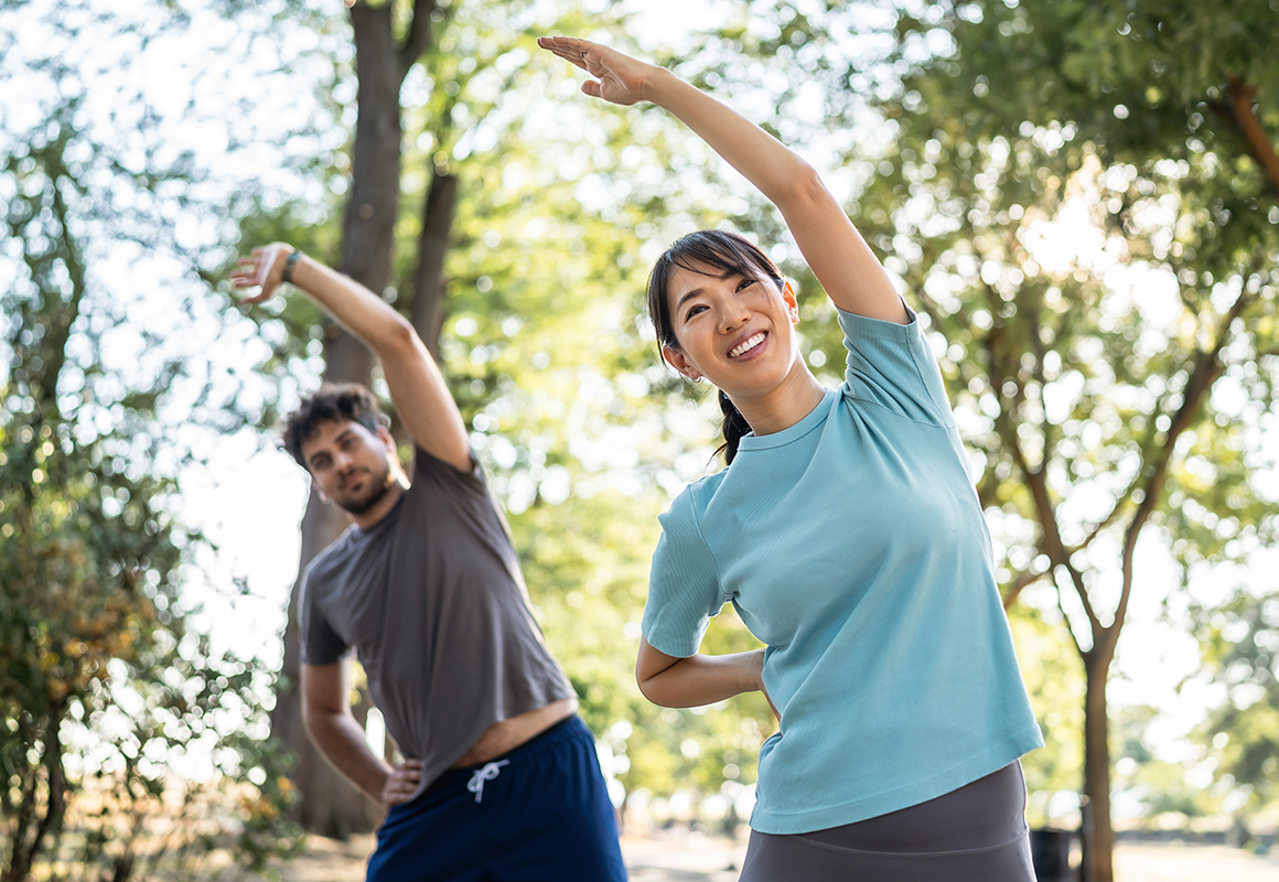 woman and man stretching