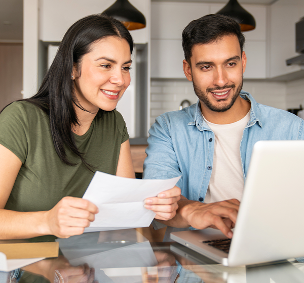 Man and woman on laptop
