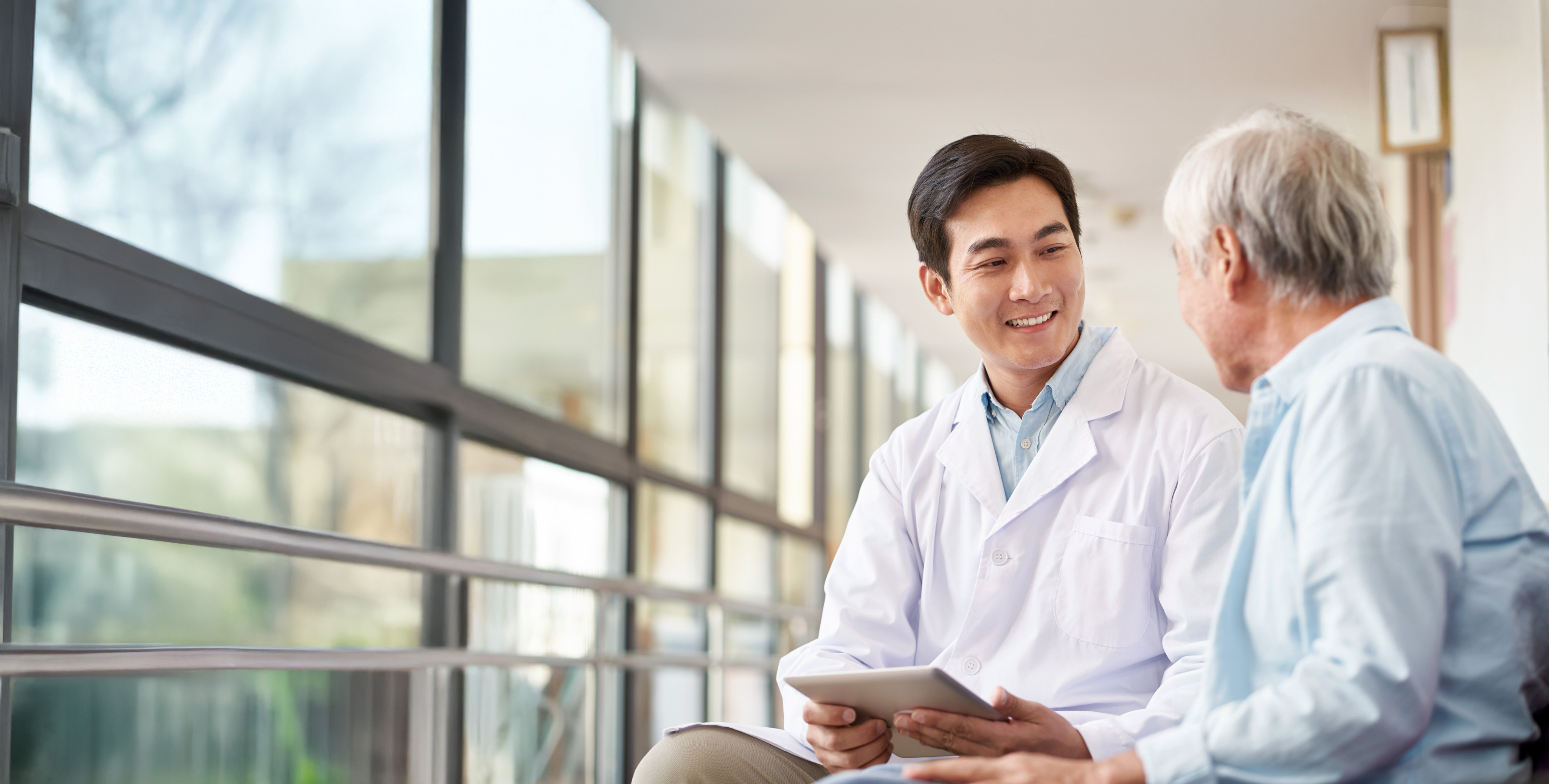 doctor speaking with patient