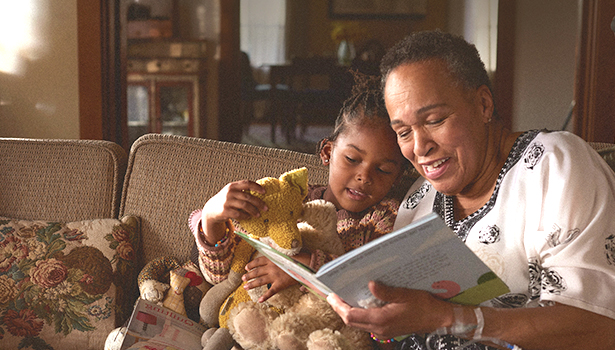 Sarah reading her grandchild a story