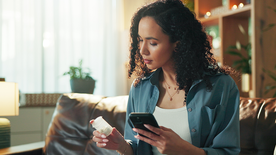Woman looking at a prescription 