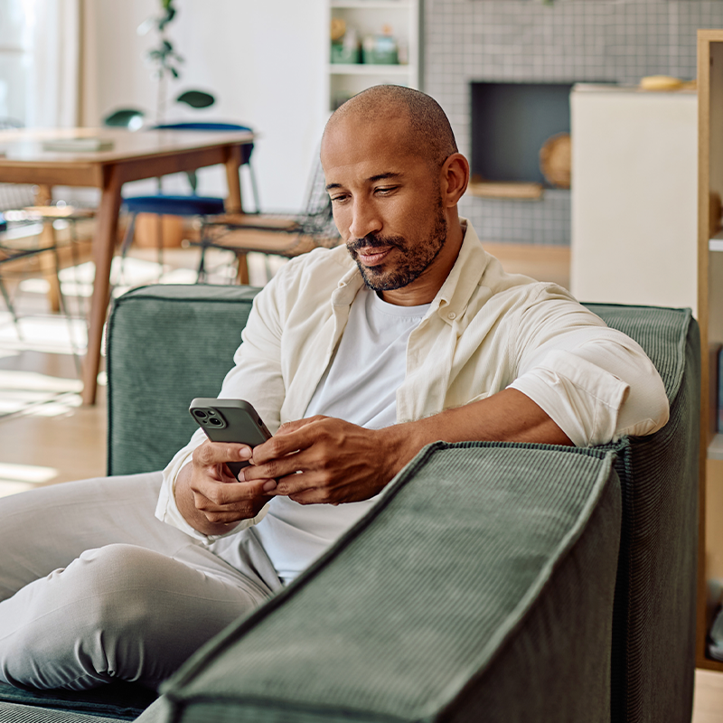 Man on phone at home