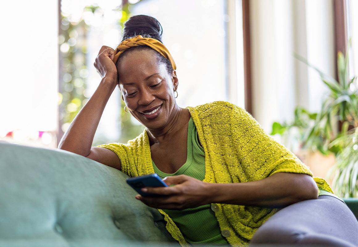 woman on cell phone smiling