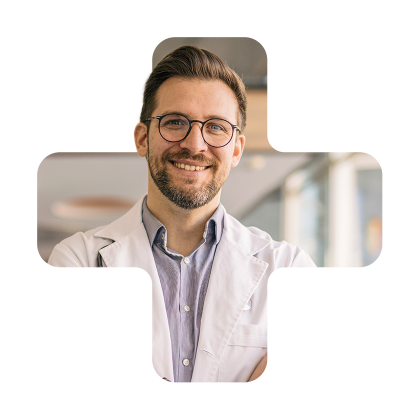 doctor wearing glasses and smiling