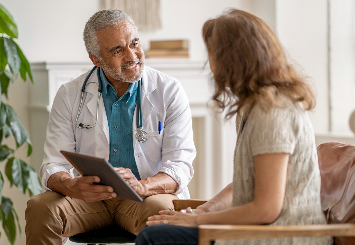 woman speaking with her doctor