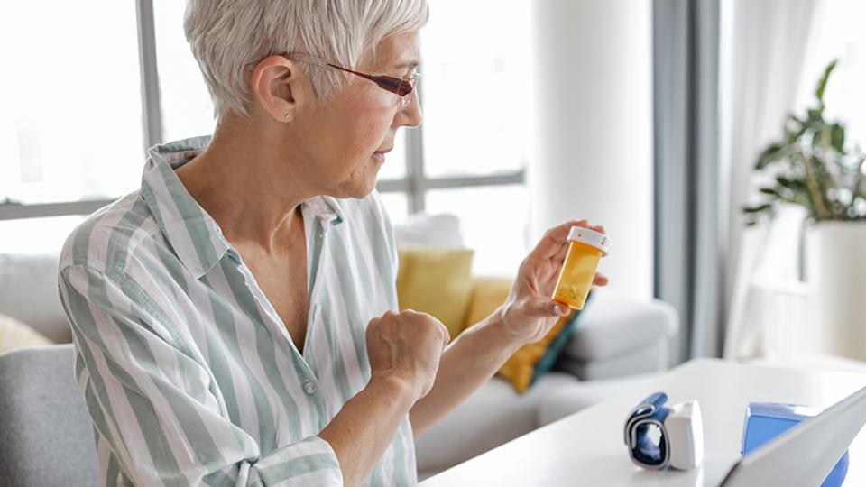 Woman holding prescription
