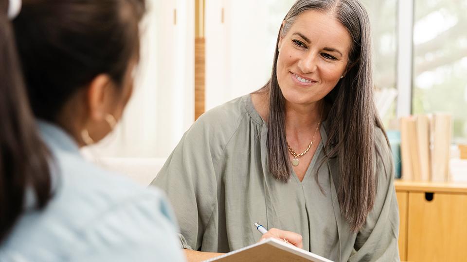 Therapist with client