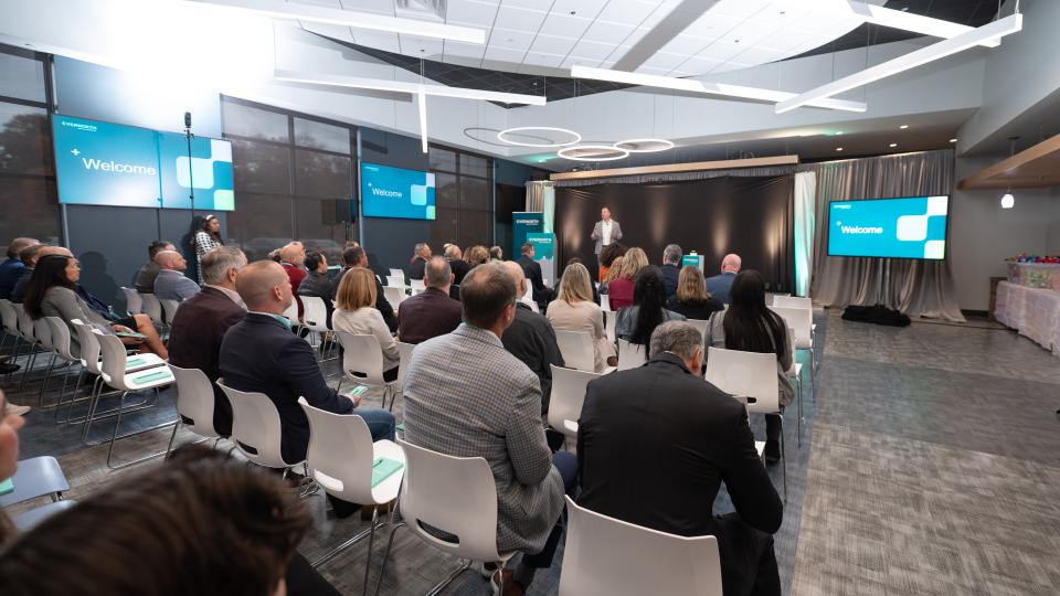 audience listens to remarks during the grand opening of a new Evernorth facility in Newark, Delaware