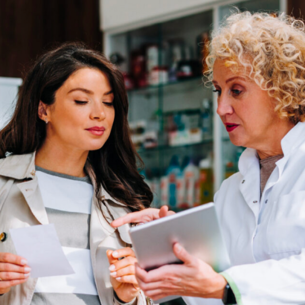 Two women looking at a tablet