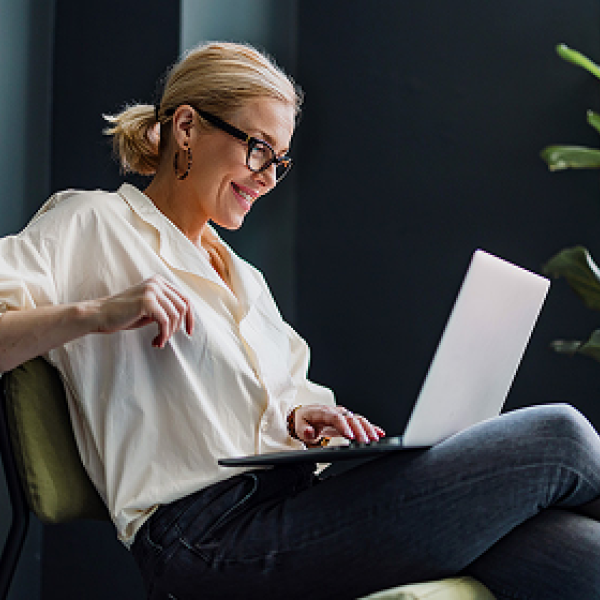 woman looking at a laptop computer