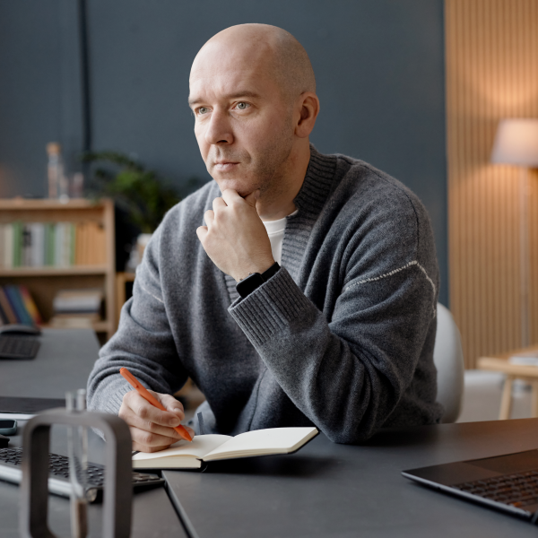 man looking at computer