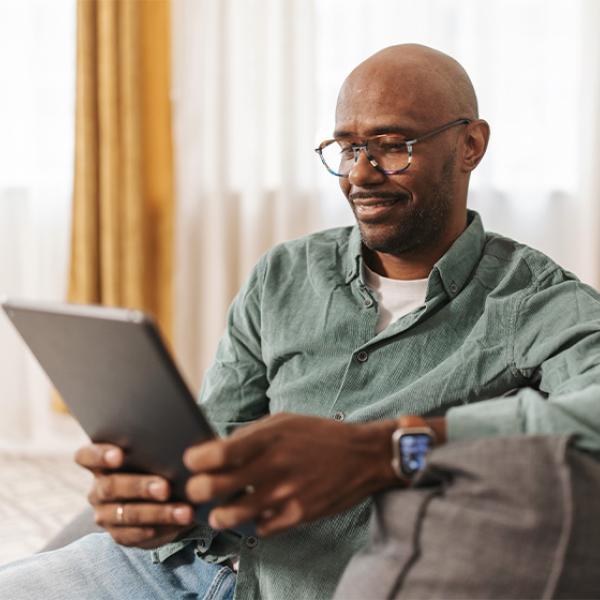 man on tablet