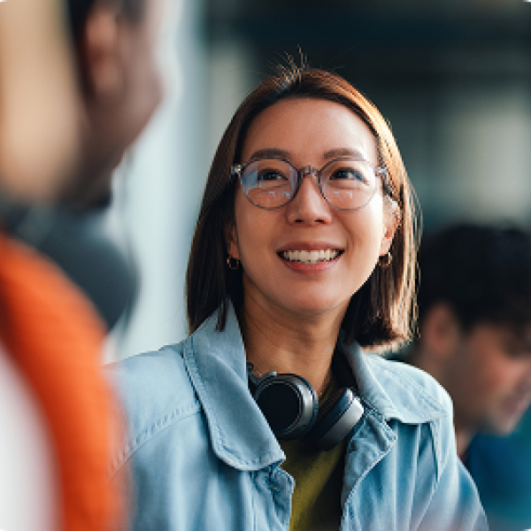 woman in glasses smiling