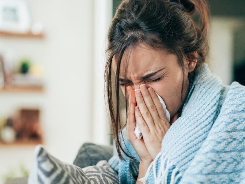 A photo of a woman who has the flu