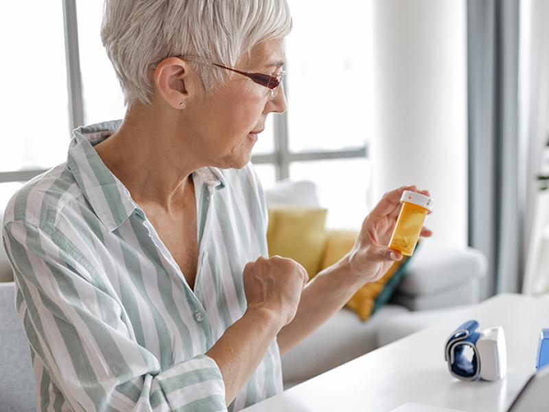 Woman holding prescription