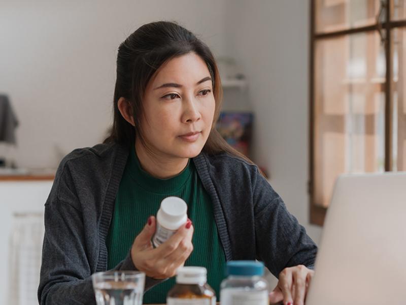 Woman holding prescription