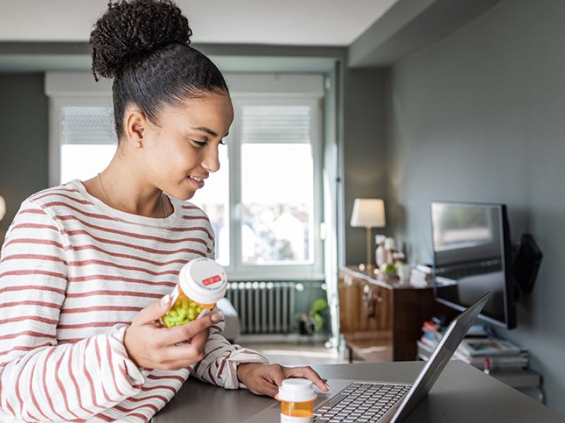 woman holding prescription