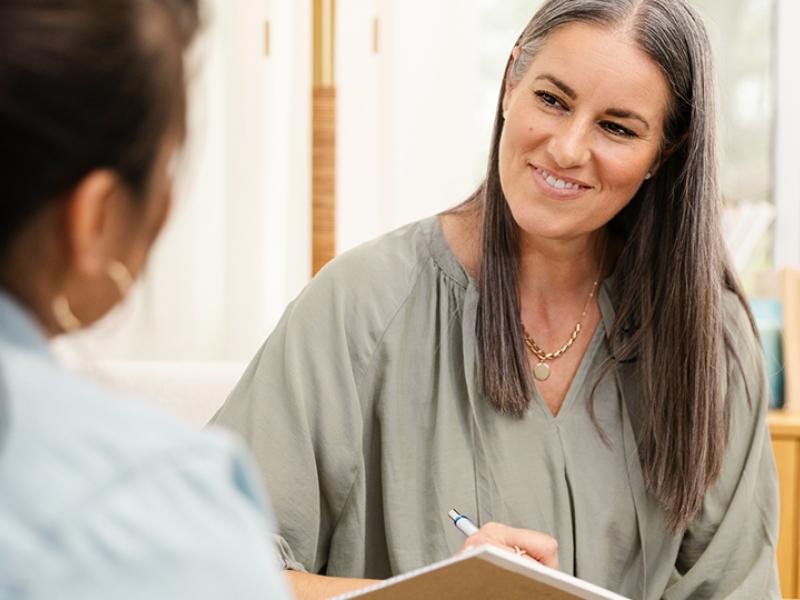 Therapist with client