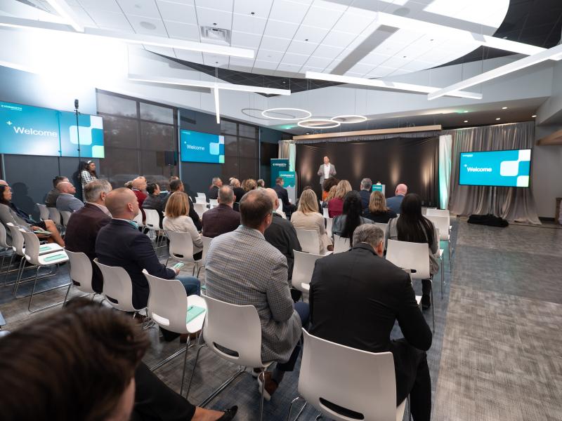 audience listens to remarks during the grand opening of a new Evernorth facility in Newark, Delaware