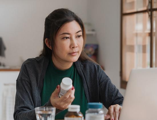Woman holding prescription