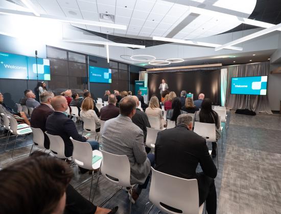 audience listens to remarks during the grand opening of a new Evernorth facility in Newark, Delaware
