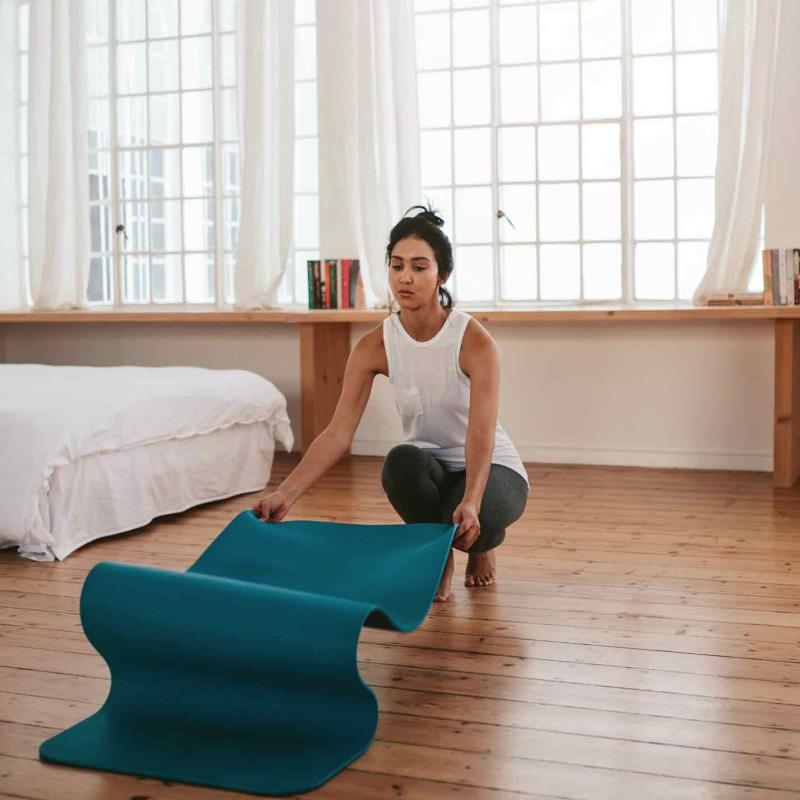 Woman at home practicing whole-person health